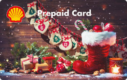 Shell Prepaid Card "X-Mas Magic" mit dem Motiv eines weihnachtlich dekorierten Kamins